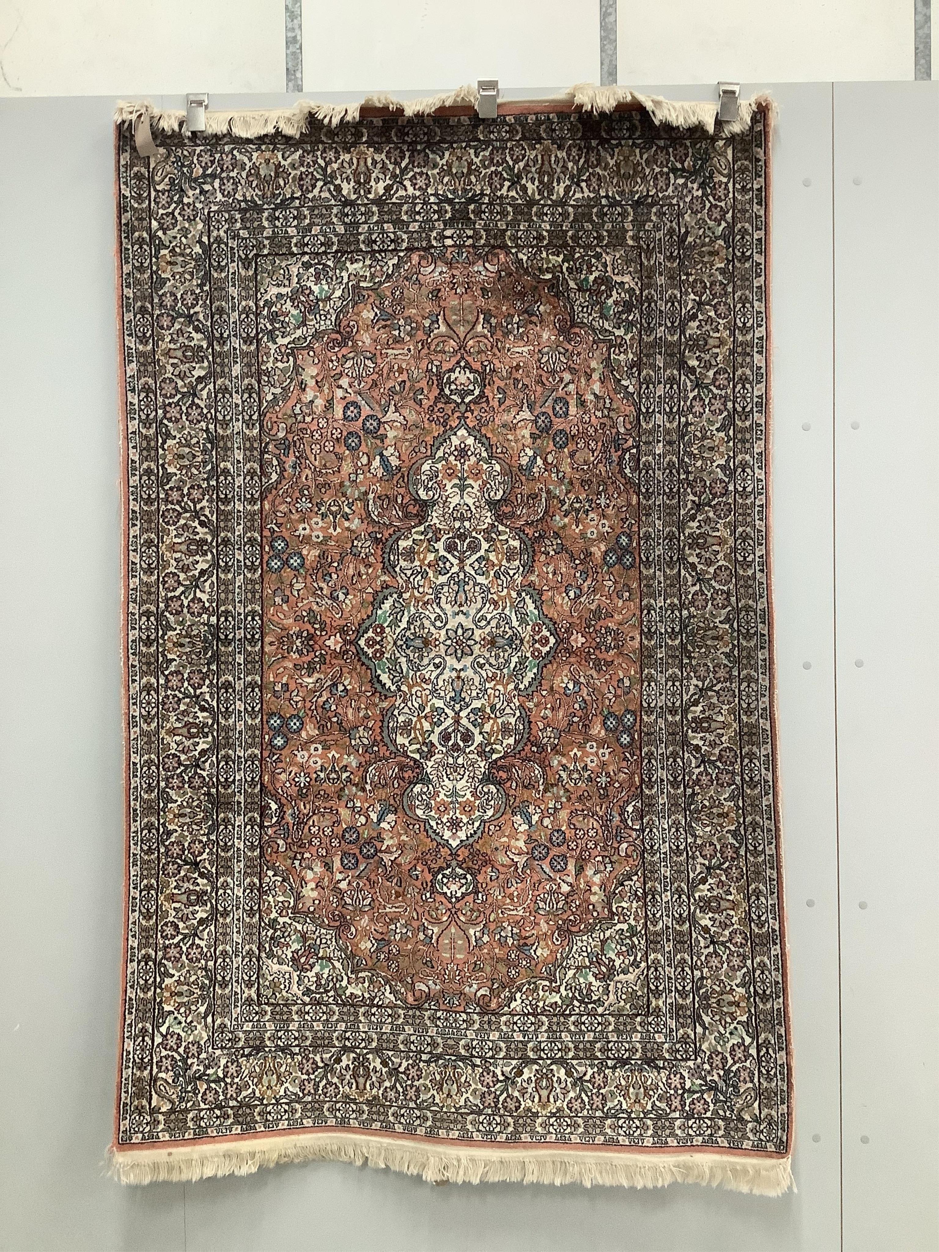 An Indian Persian style rug, 180 x 118cm. Condition - good